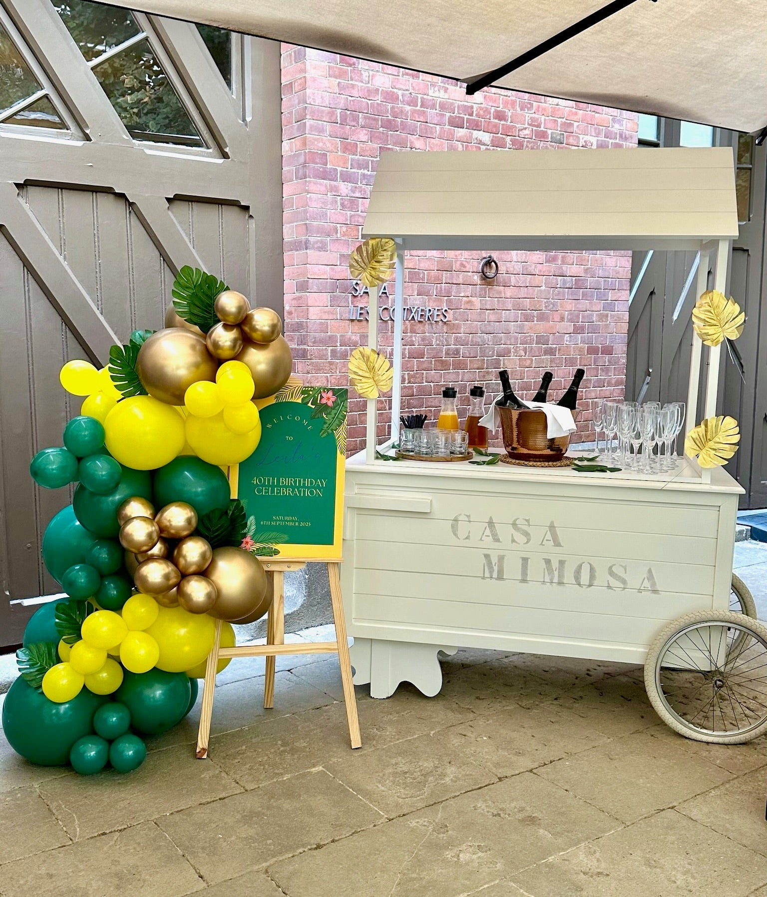 Elegant hotel celebration in Barcelona with a balloon arrangements - event planned by Straws ’n Berries