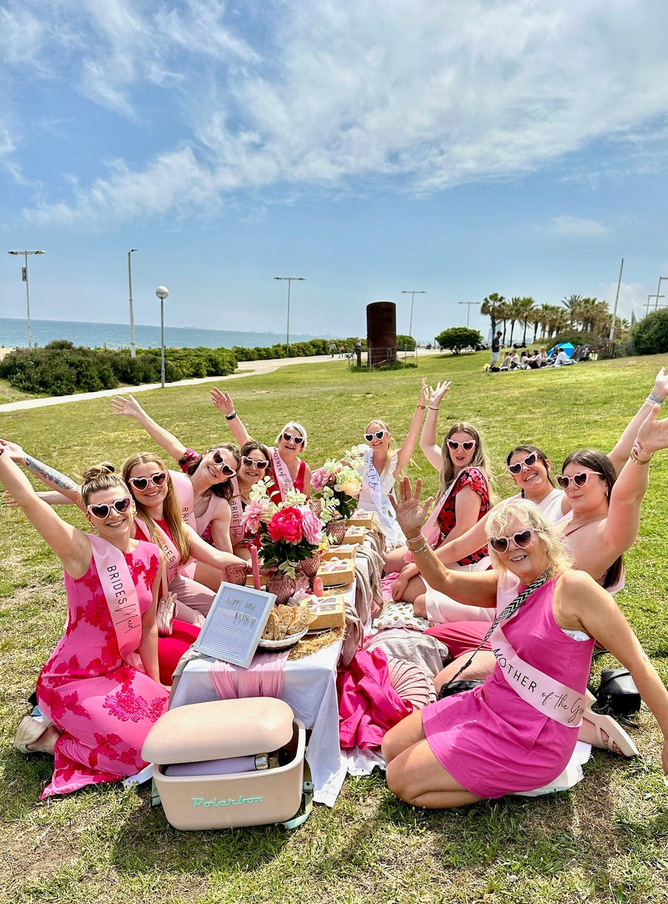 Celebrate the bride-to-be in style with our fun pink glasses, the perfect accessory to add a playful and glamorous touch to your luxury hen party picnic in Barcelona.