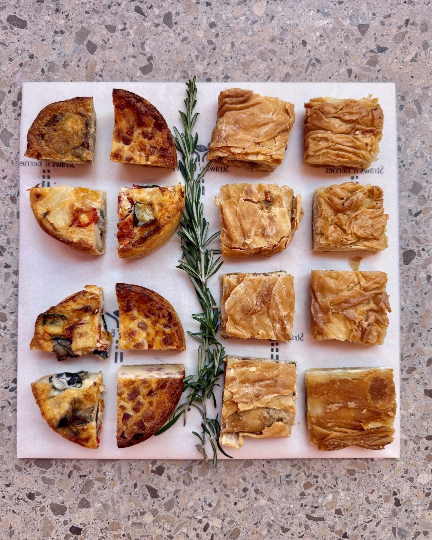 Delicious Pastry Savory Platters in Barcelona, featuring freshly prepared quiches and pita filos with vegetarian and meat options, perfect for any event or gathering.