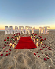 Create an unforgettable proposal in Marbella with our illuminated XXL Marry Me Letters, designed to make your special moment shine with romance and charm.