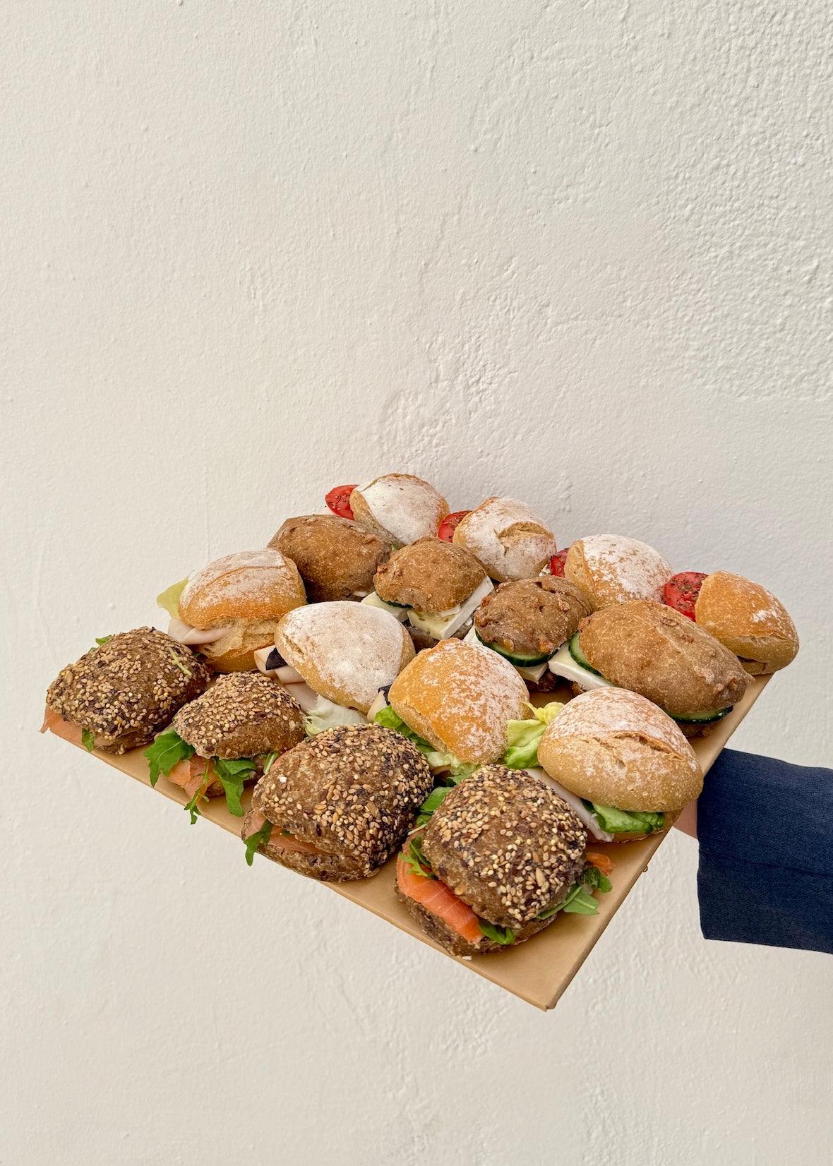 Board with small luxury sandwiches in Barcelona 